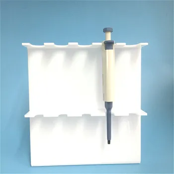 Akrila Pipeti Stāvēt Baltā organiskā stikla pipetēšanas ierīci Turētājs Z-veida ar pipeti iepilina Paliktni var saglabāt Līdz 5 vienkanāla Pipetes Biezums 5 mm