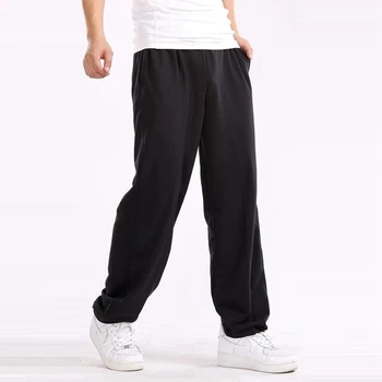 Rudens vīriešu sporta bikses treniņbikses lēti liels pārdošanas liela izmēra 7XL bikses, lai vīrietis melnā ādas elastību bikses Taisnas Bikses, kokvilnas